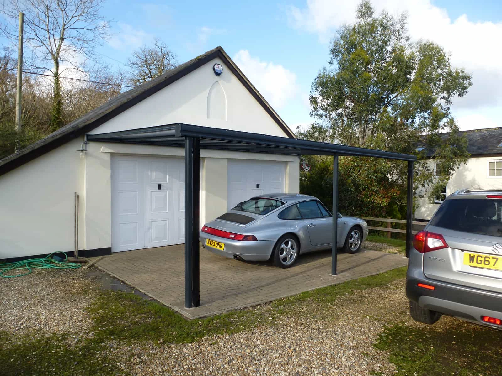 Harbour carport installed on a brick-built British home