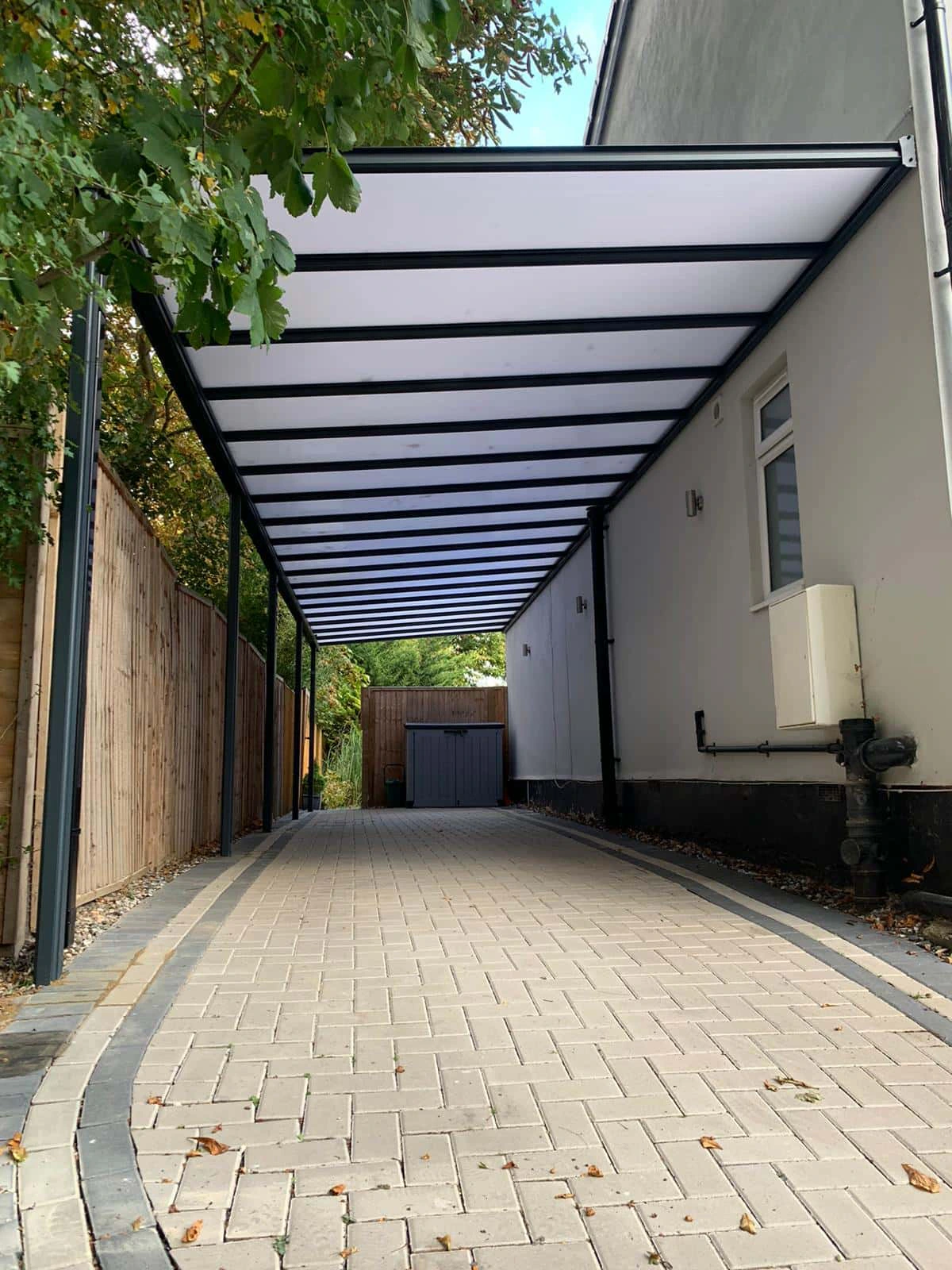 Harbour carport fitted to a traditional brick home