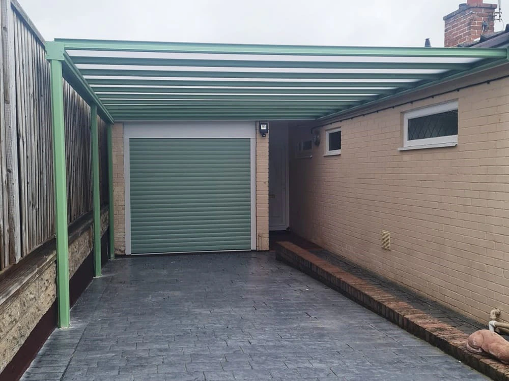 Harbour carport with slim aluminium frame on a paved drive